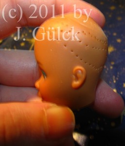 As you can see the doll has no hair at the moment after 2 hours of work