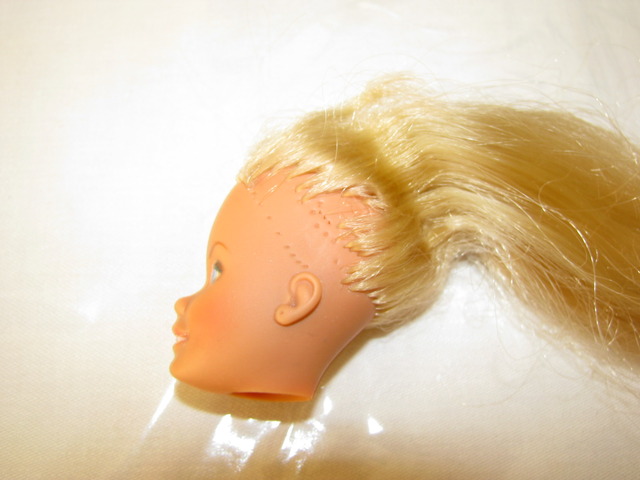 Barbie head before reroot