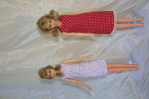 two blonde francies in mod dresses, the left original from the 1960s, the right is handmade in red fabric with withe dots and a tiny cream ribbon at the bottom