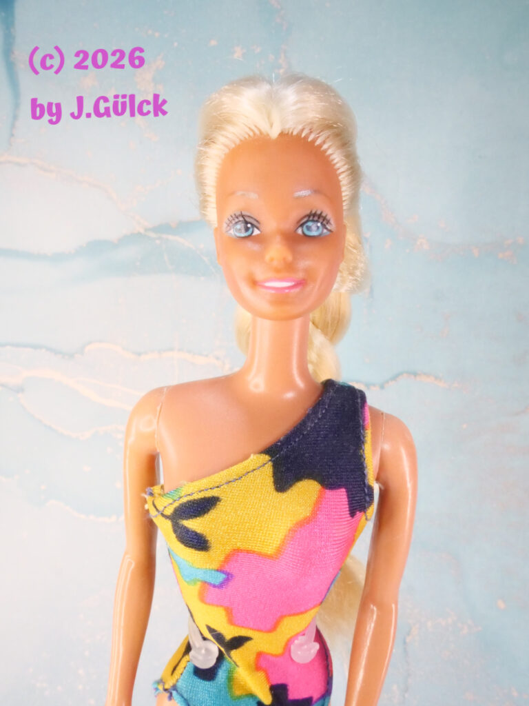 Tropical Barbie made in Spain is this funny girl. Her eyes are lighter.